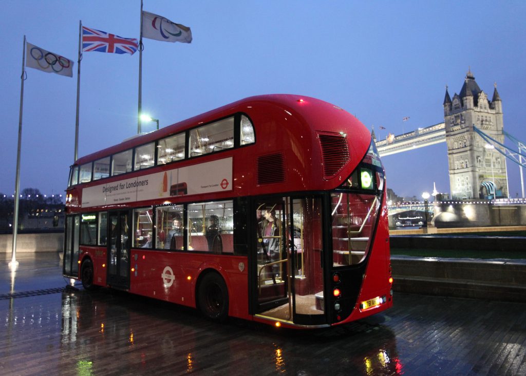 New Bus for London near Tower Bridge at night